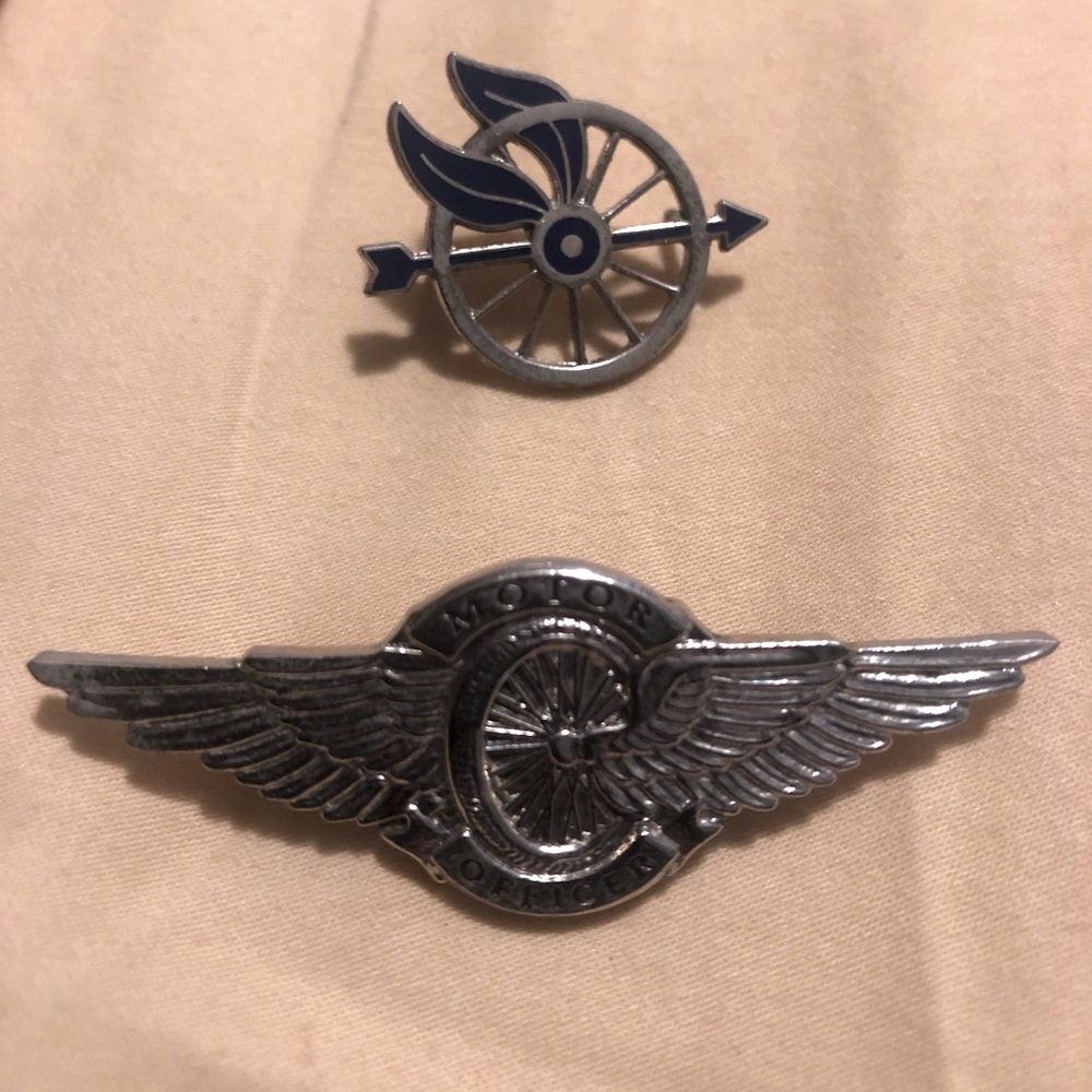 Police motorcycle unit collar pin and pocket pin.